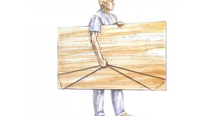 an illustration of a man picking up a large piece of plywood