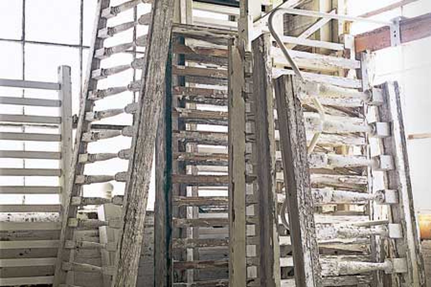 Several old porch rails in need of restoration.