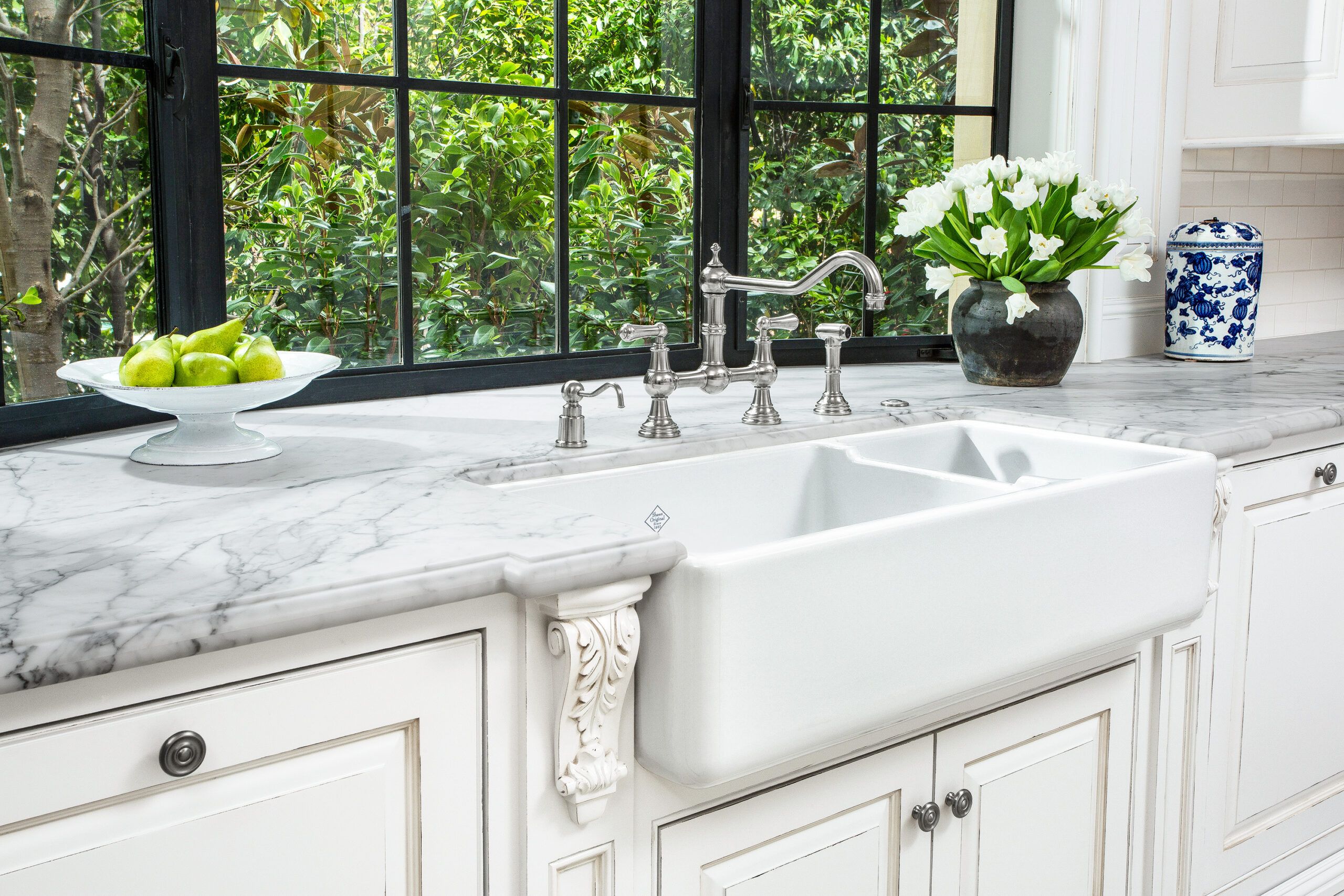 a farmhouse sink that is pulled forward