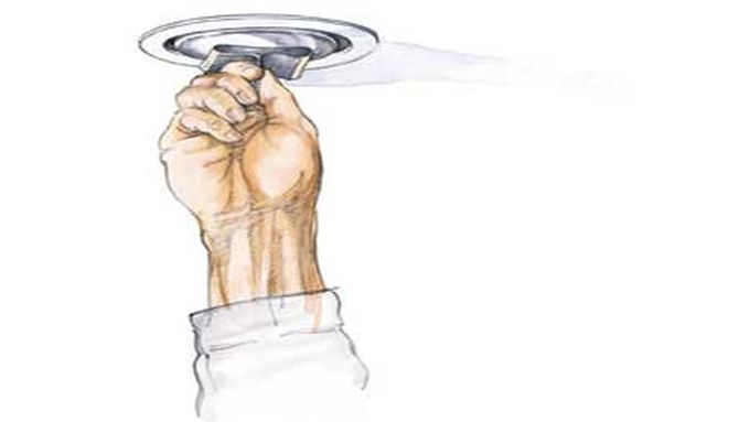 illustration of safely loosening a recessed light bulb