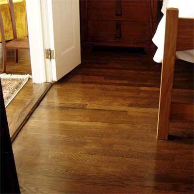 Refinished wood floor make a small space more inviting.