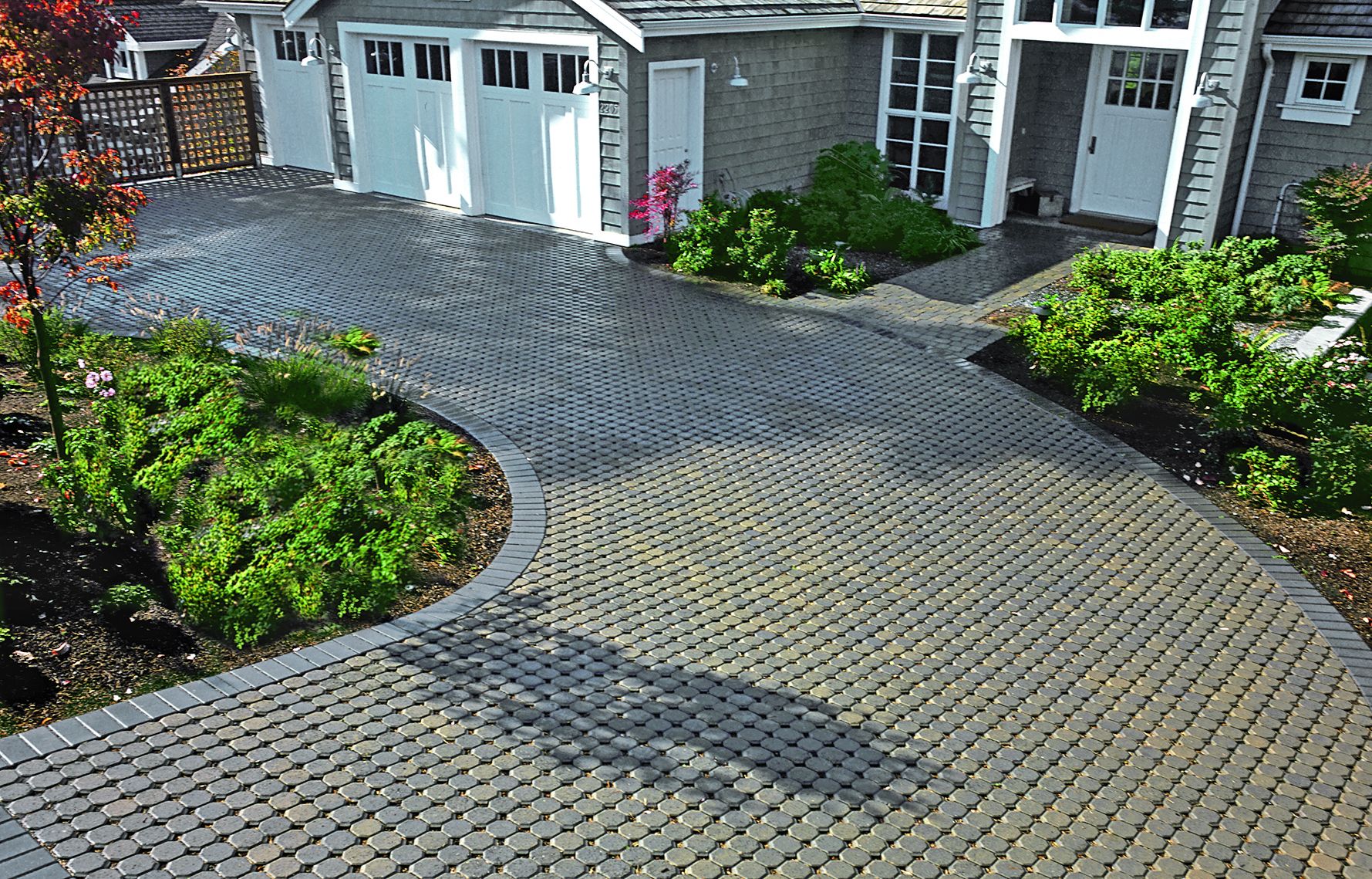 Pervious paving to help with rain water drainage.