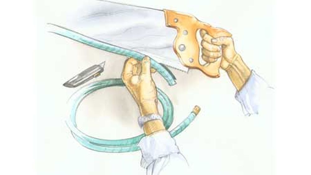 Illustration of a saw blade sheath being put on a handsaw.