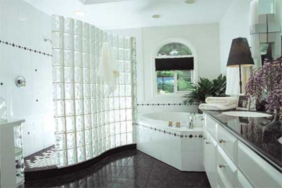 Bathroom with a separated shower and tub.