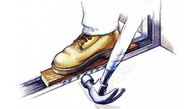 An illustration of a man using a hammer to fix a sliding door track.