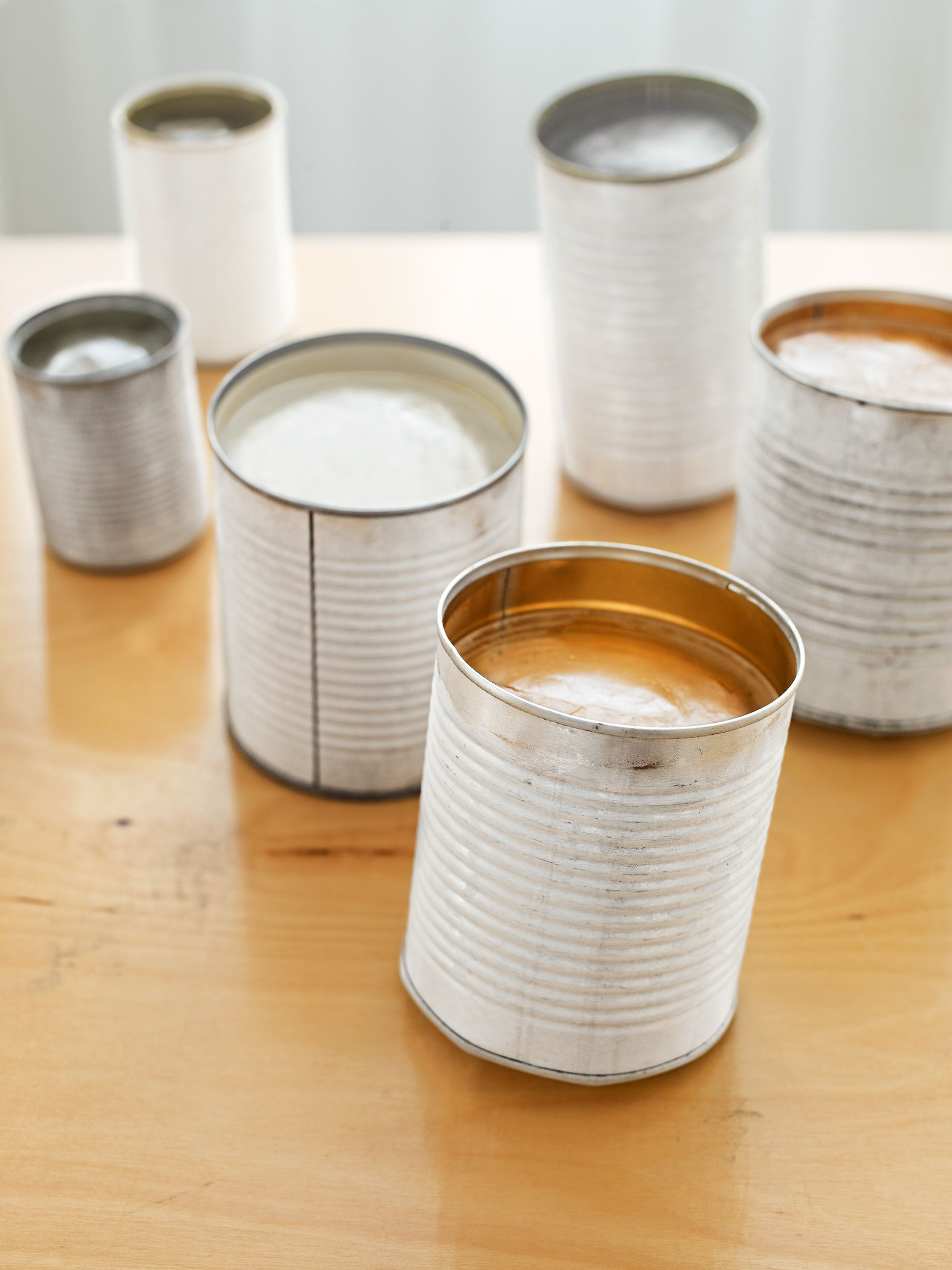 frozen tin cans with ice