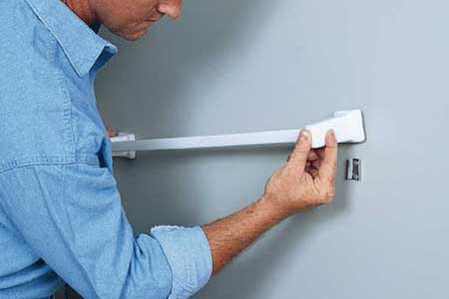 Anchoring a towel bar