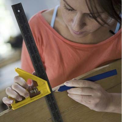 Woman measuring shutter