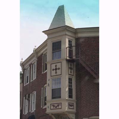 Corner home with a rectangular turret