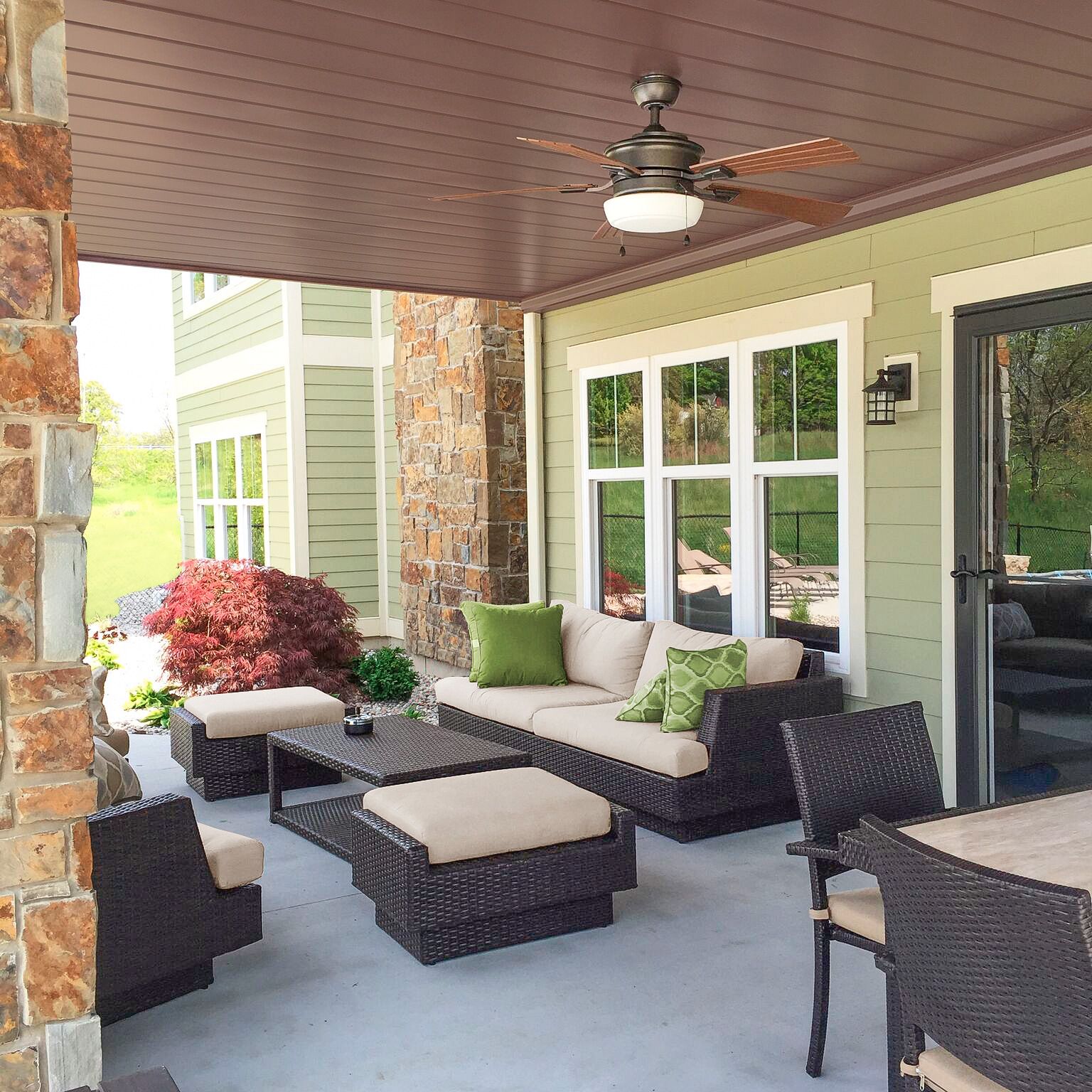 a backyard patio and deck