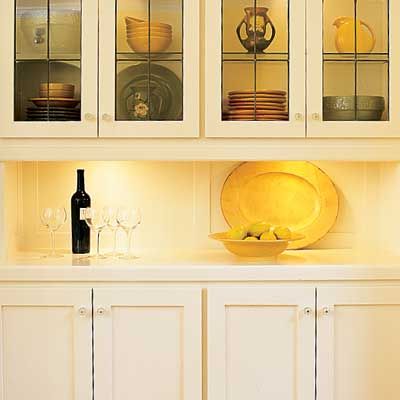 Kitchen cabinets with undercabinet lights.