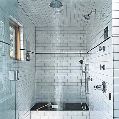 A shower with multiple shower heads for accessibility.