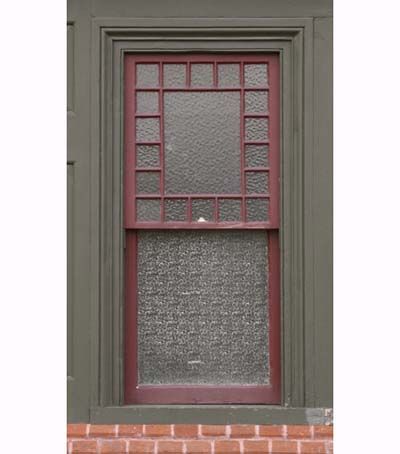 Window with patterned glass for privacy.