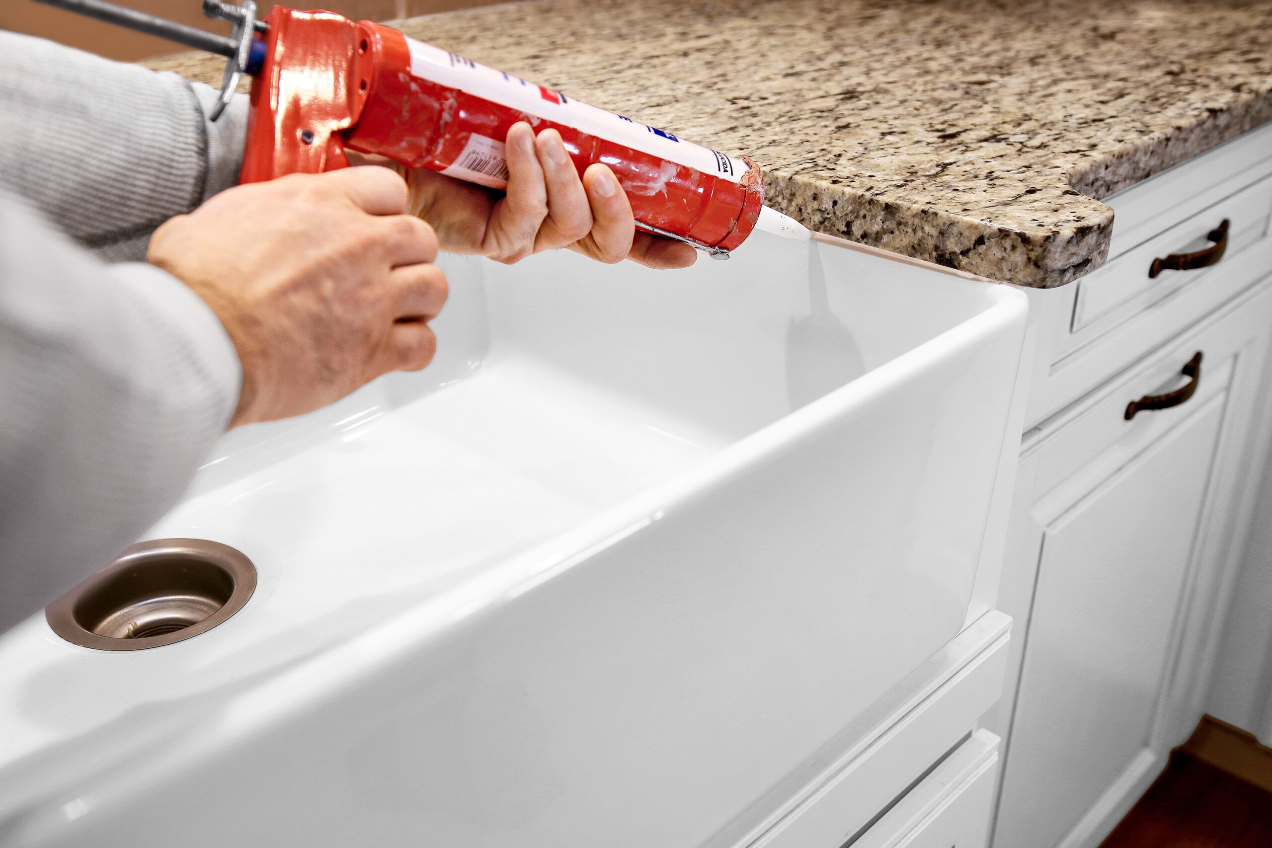 caulking around a farmhouse sink