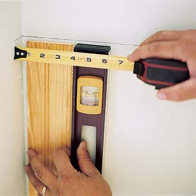 measuring the wainscoting against a wall