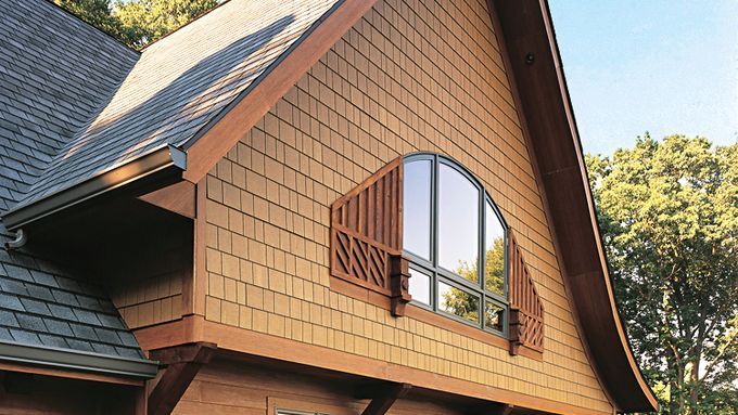 A home with wooden light brown siding.