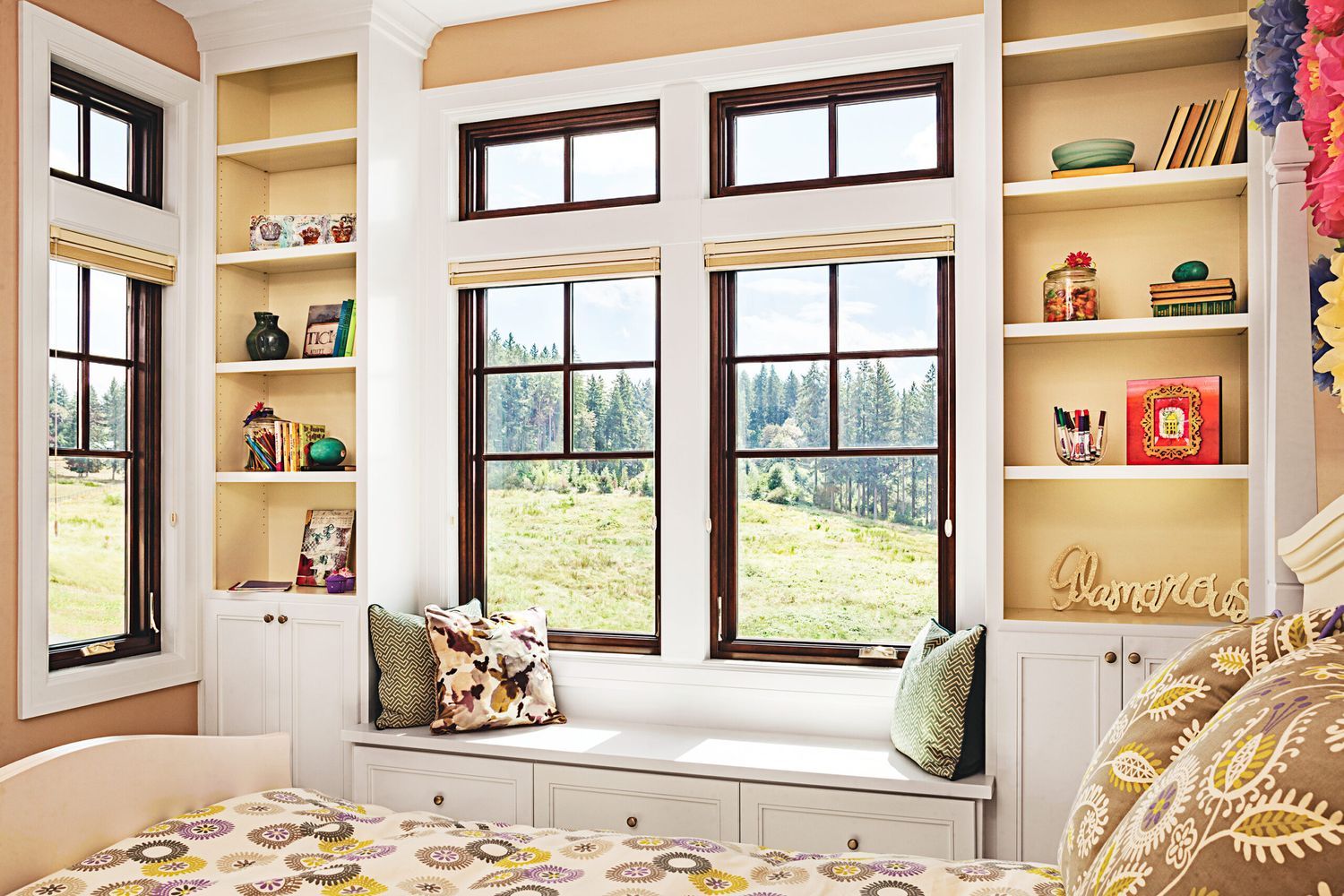 A room with 2 shelving units with fiberglass windows in between them.
