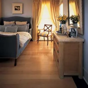 Bedroom with wood flooring