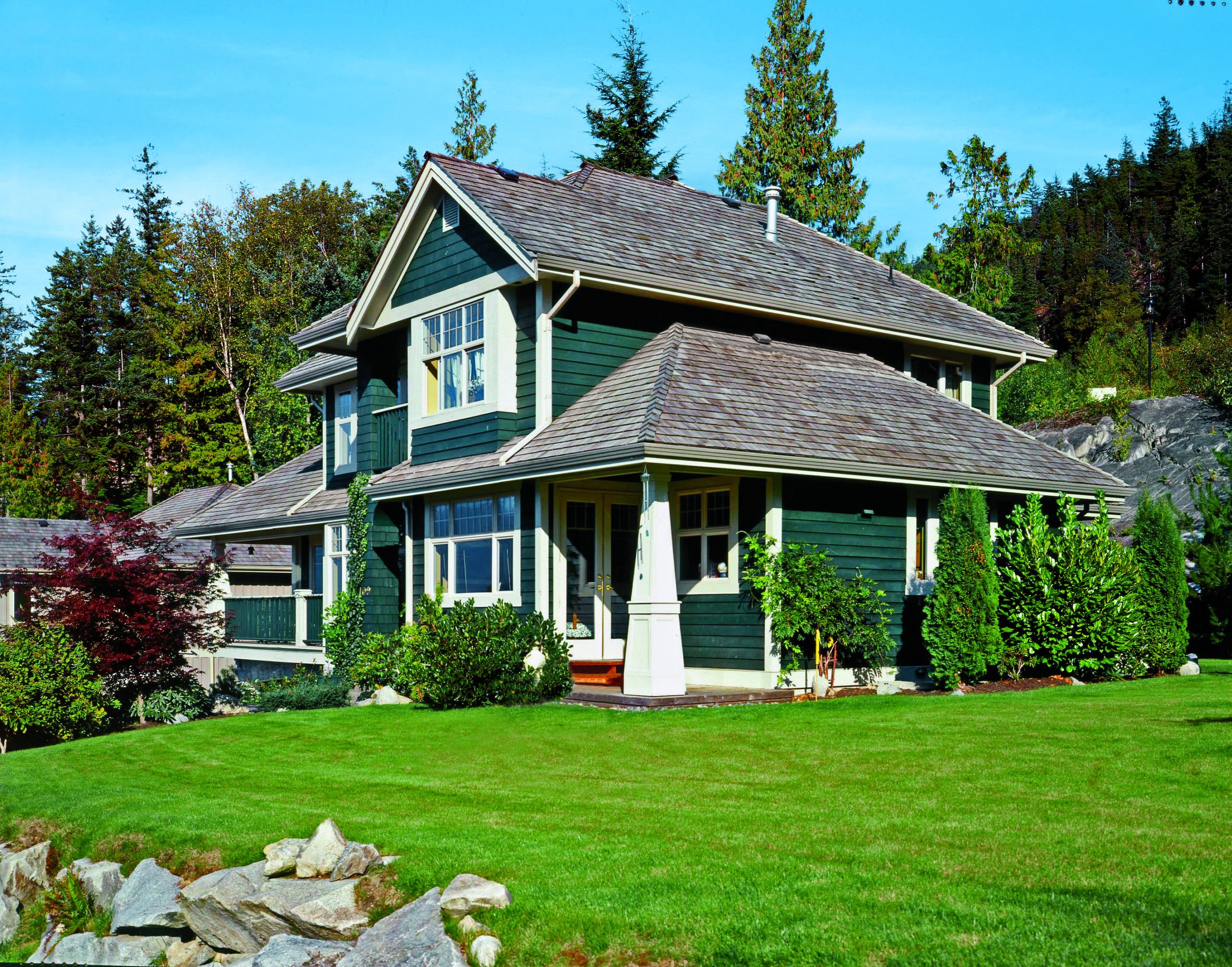 a hunter green stain on the exterior of a house