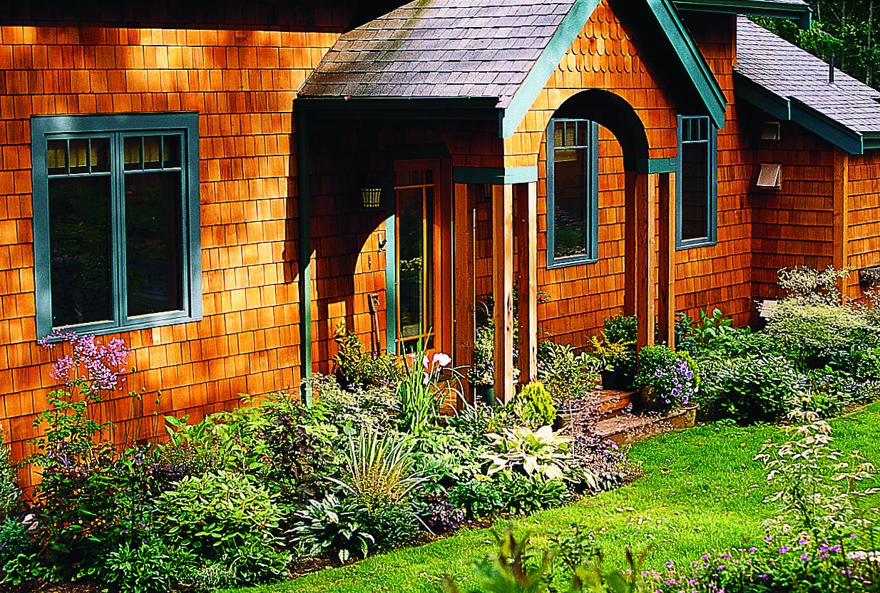 A foundation planter including a variety of perennials.