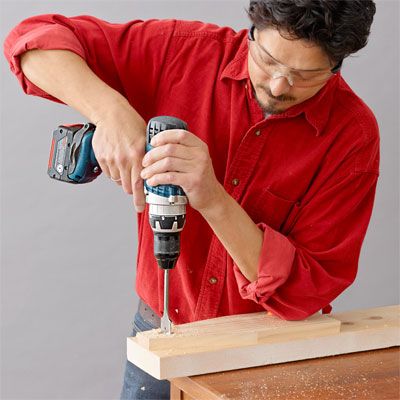 drilling the handle opening of a six-pack carrier