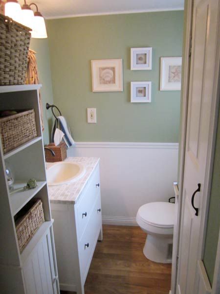 a vanity in a bathroom with a tile countertop