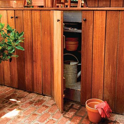 storage cabinets that are under a deck