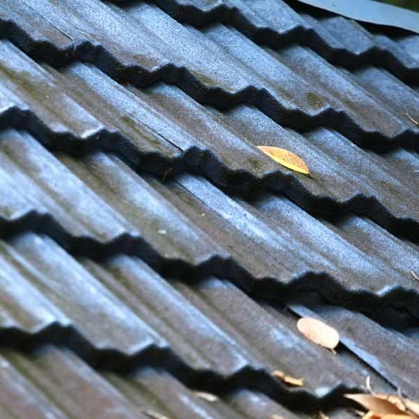 Close-up Asbestos Built-up Roofing Layers, Example of a com…