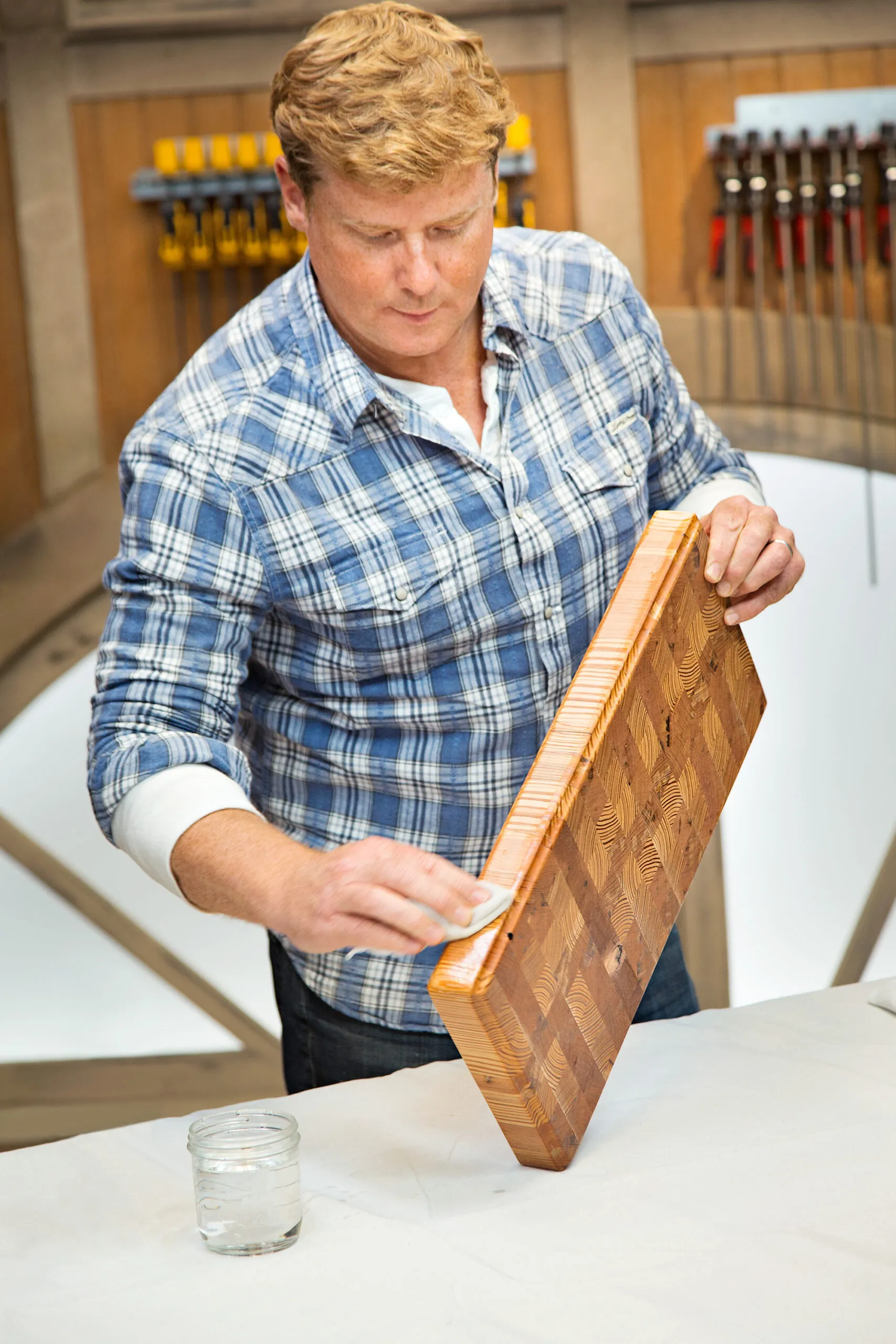 Mineral oil is applied to an end grain cutting board.