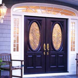 A custom front door with decorative glass.