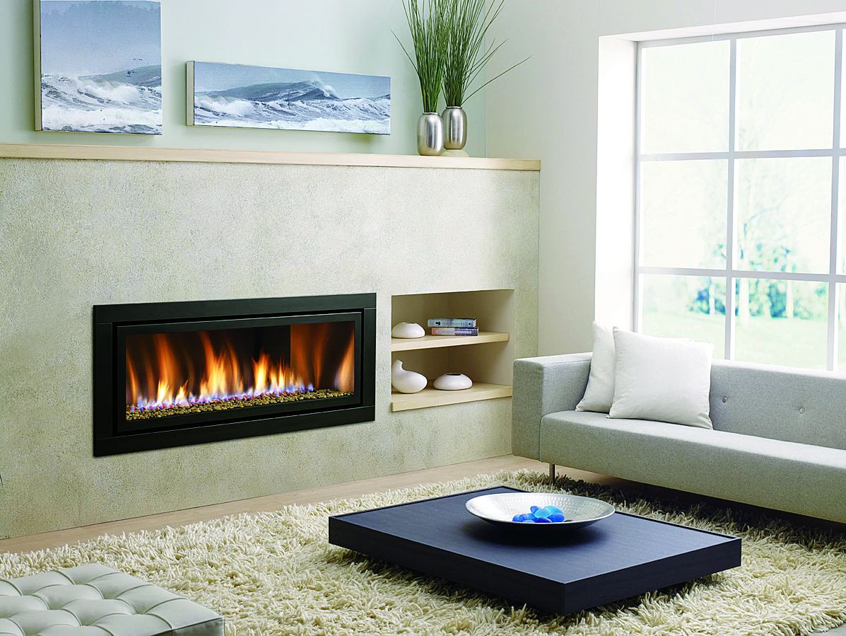 A gas fireplace in a living room.