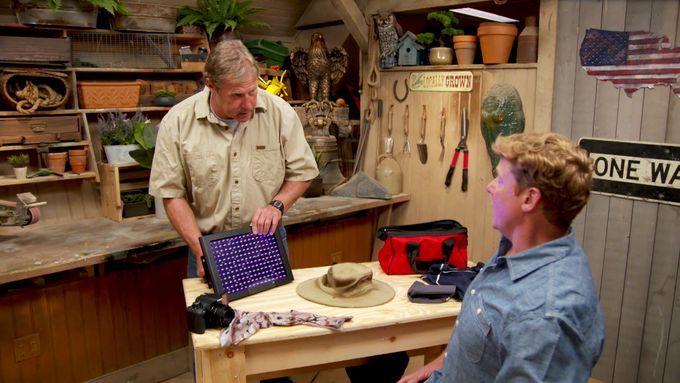 Two men discussing ways to protect the body from melanoma while working outside.