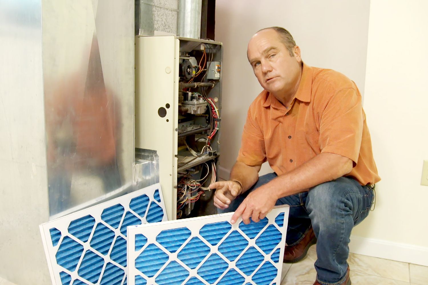 Richard Threthewey changing a filter.