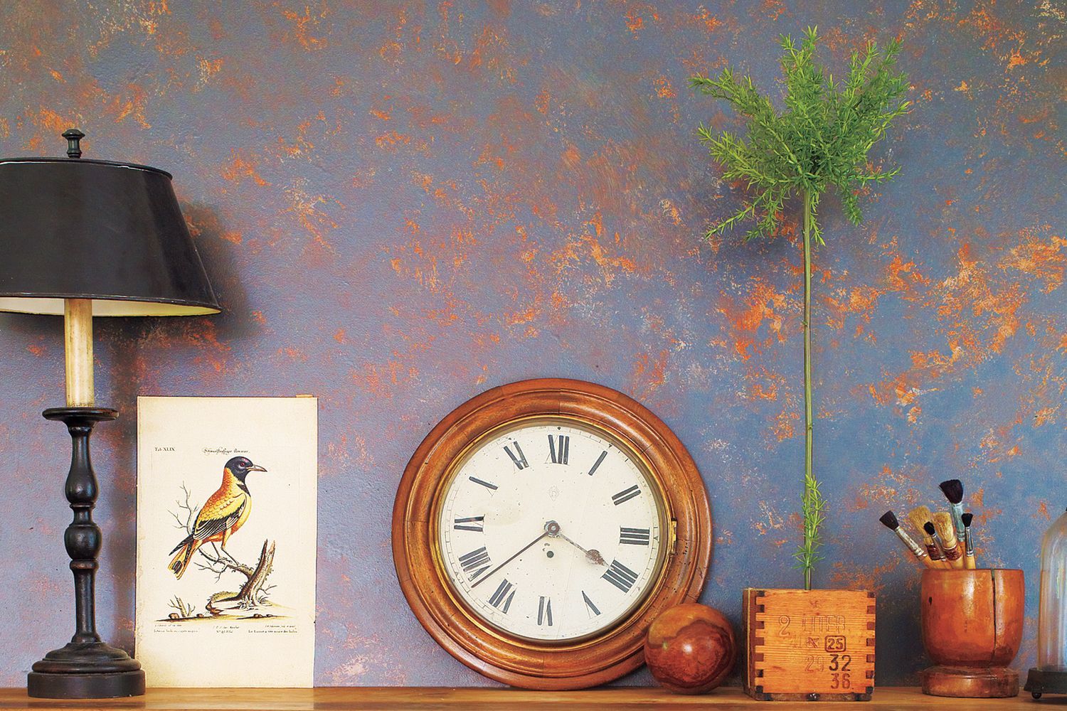 a sponge-painted wall with color and design