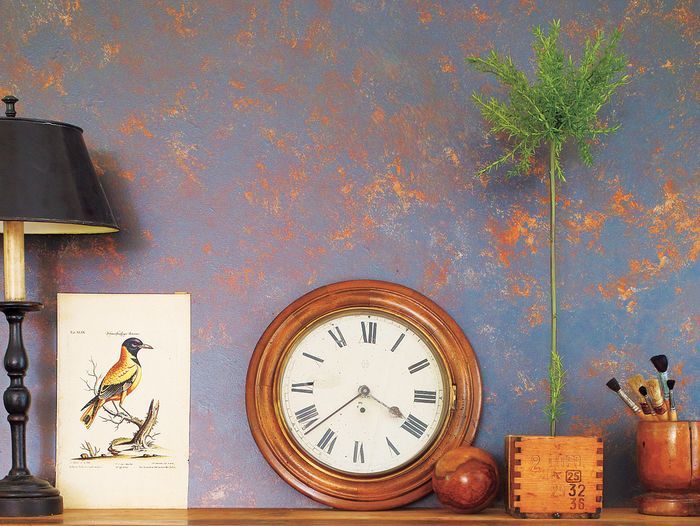 a sponge-painted wall with color and design