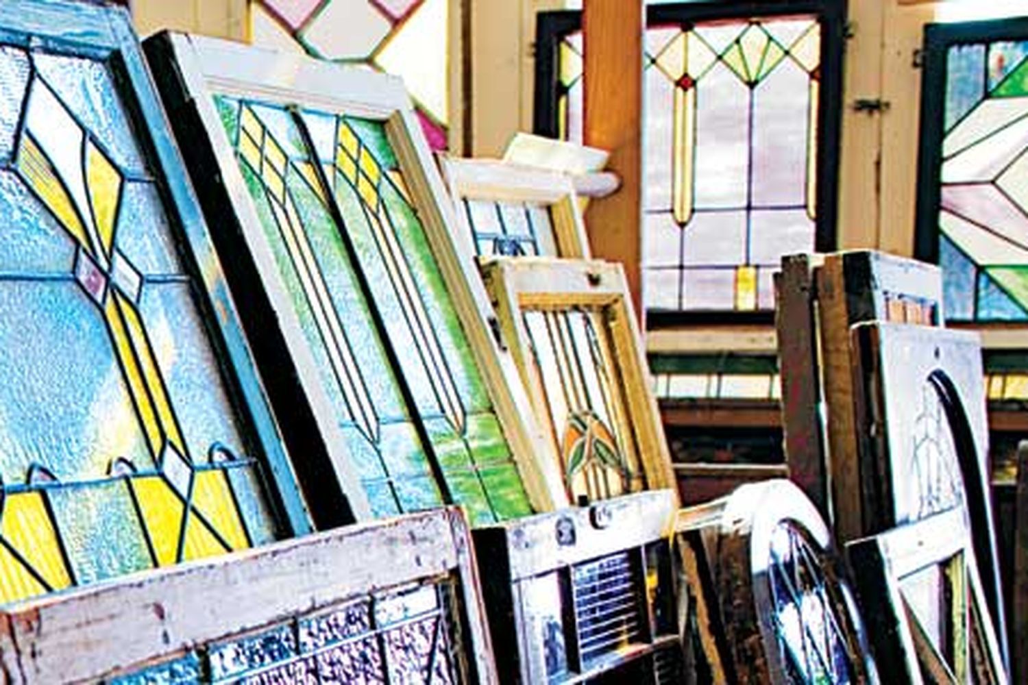 a collection of stained glass windows