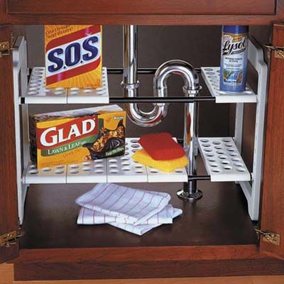 under sink storage with a shelf to organize items