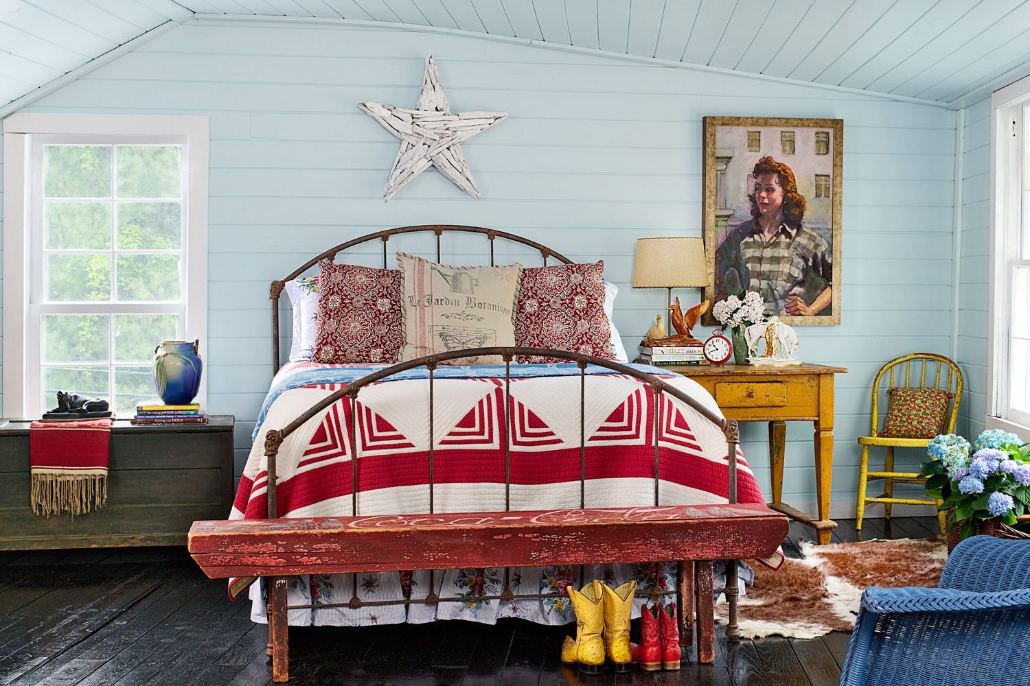 bedroom with a wall made up of wooden paneling