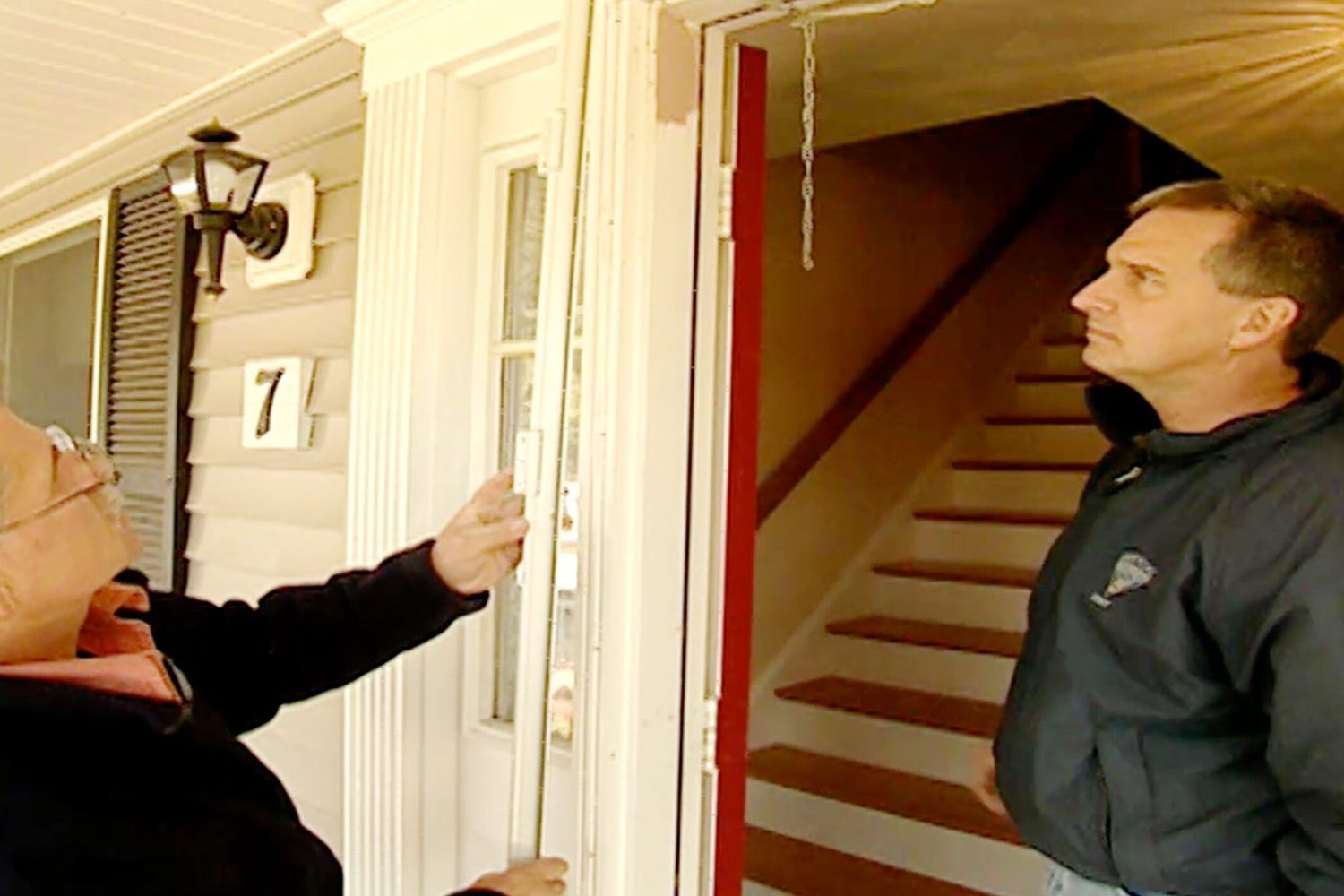 taking a look at a storm door in an effort to prevent frosting or icing up