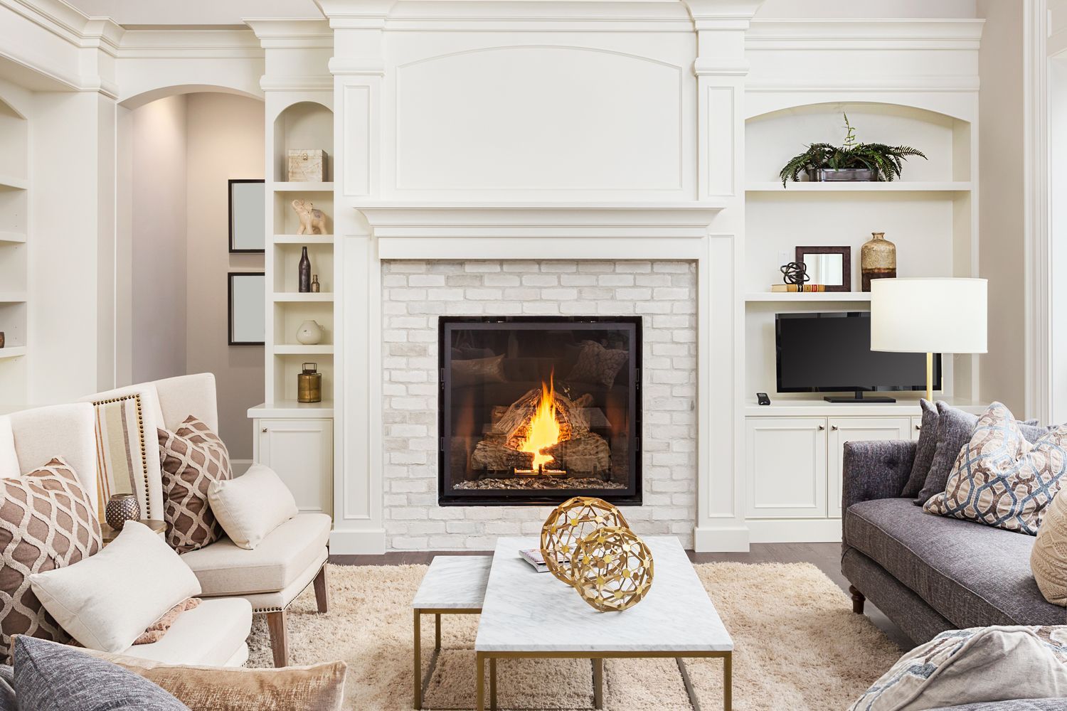 A fireplace mantel that is ready to be decorated.
