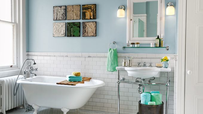 a bathroom with a finished tiled tub surround