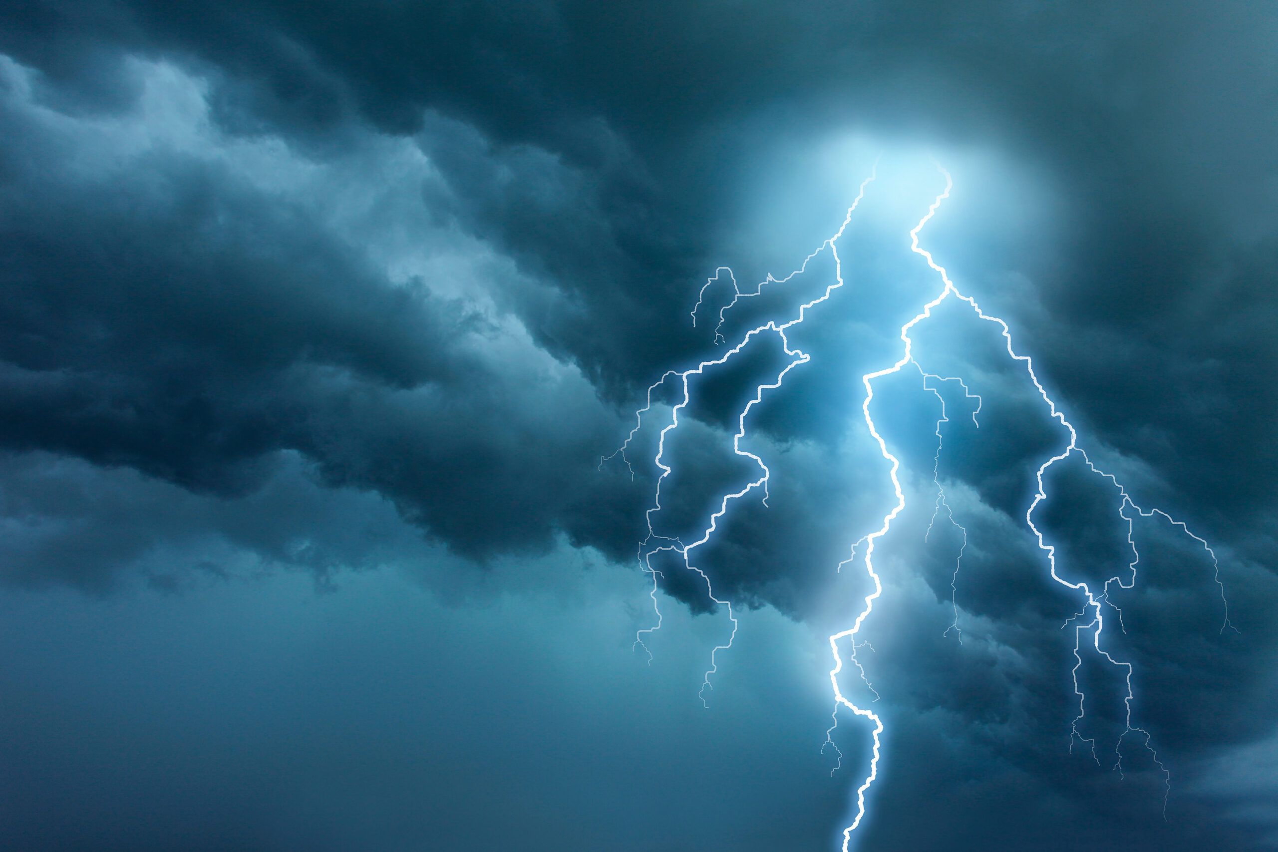 Dramatic lightening strike in a dark stormy sky.