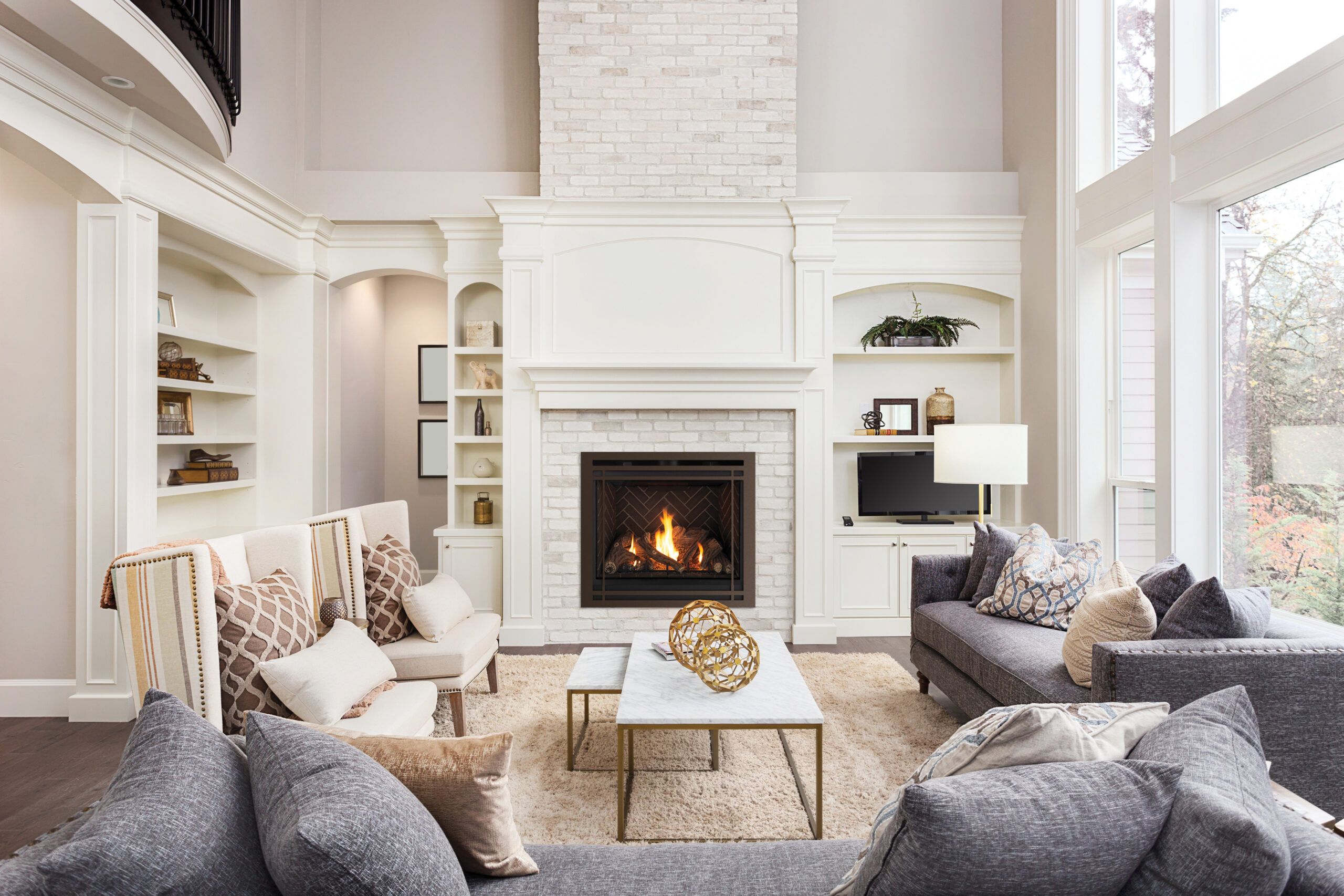 A gas fireplace in a sitting room.