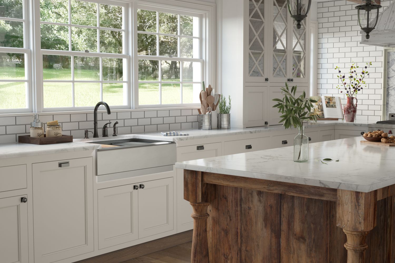 A sink set into a marble counter in a kitchen.