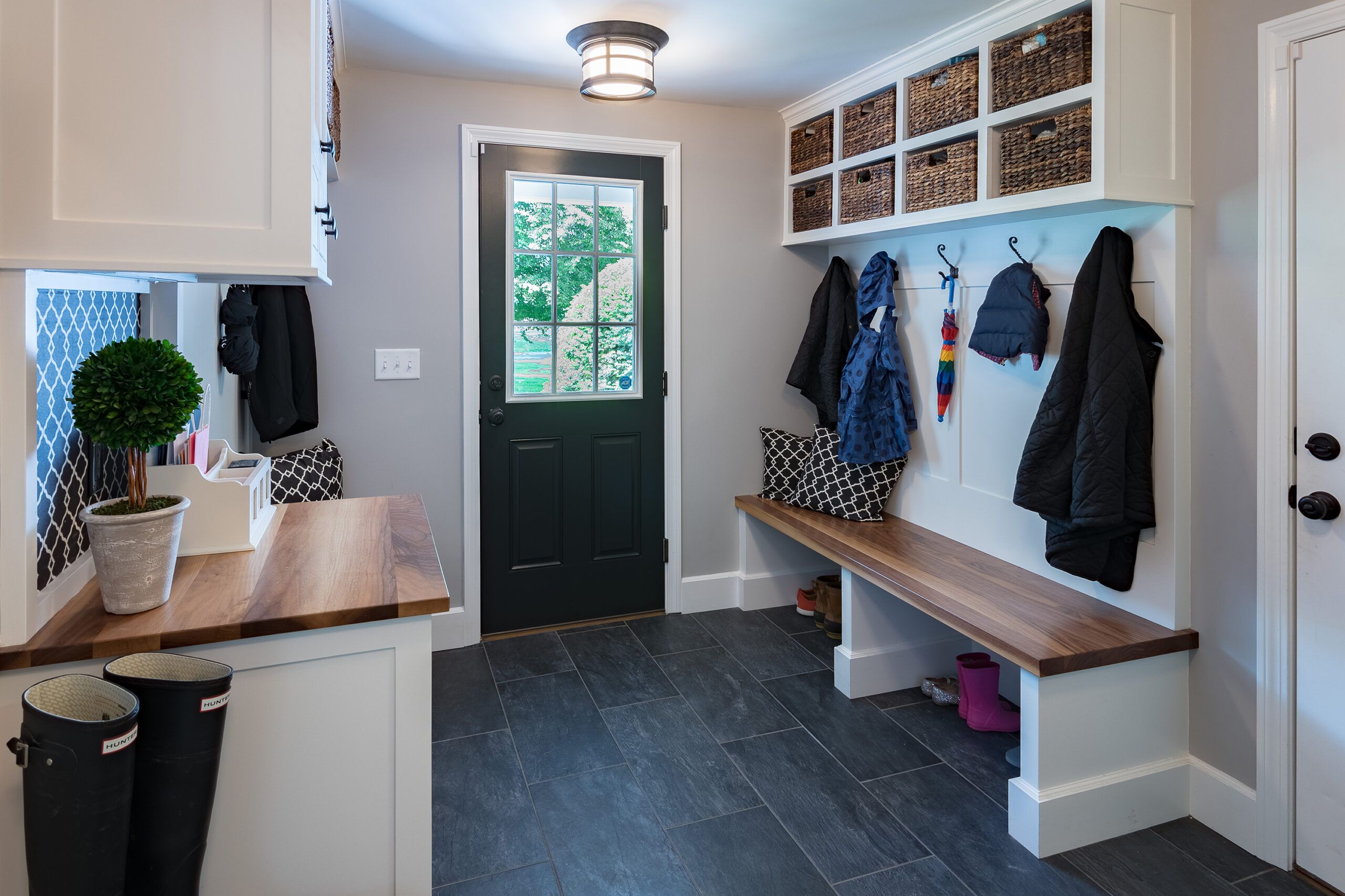 A mudroom with bench storage.