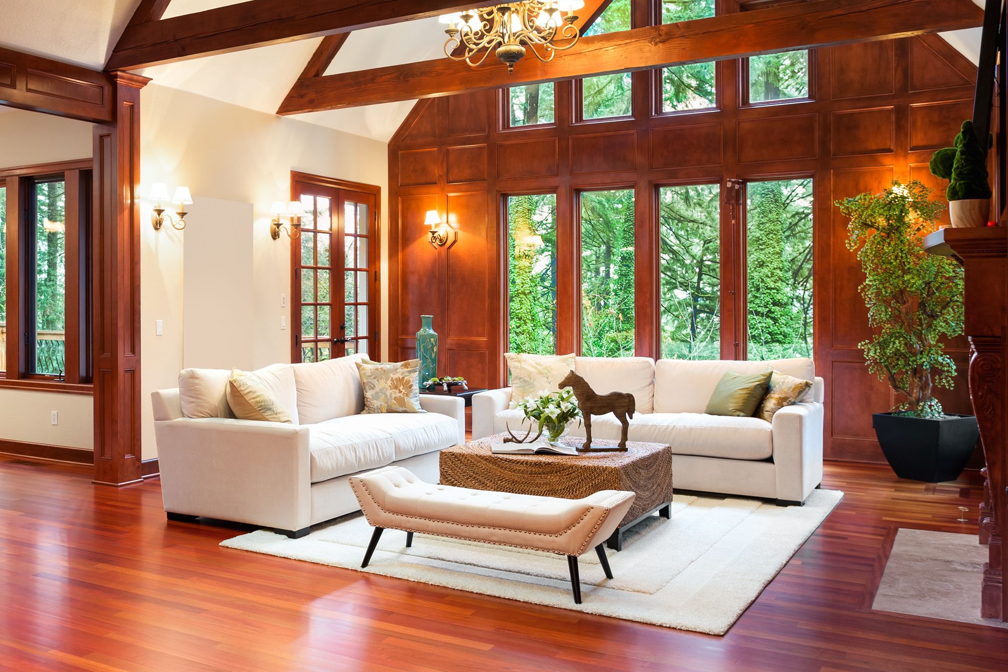 A sitting room with furniture on top of a rug.