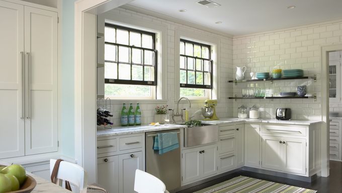 A kitchen with a stainless steel sink.