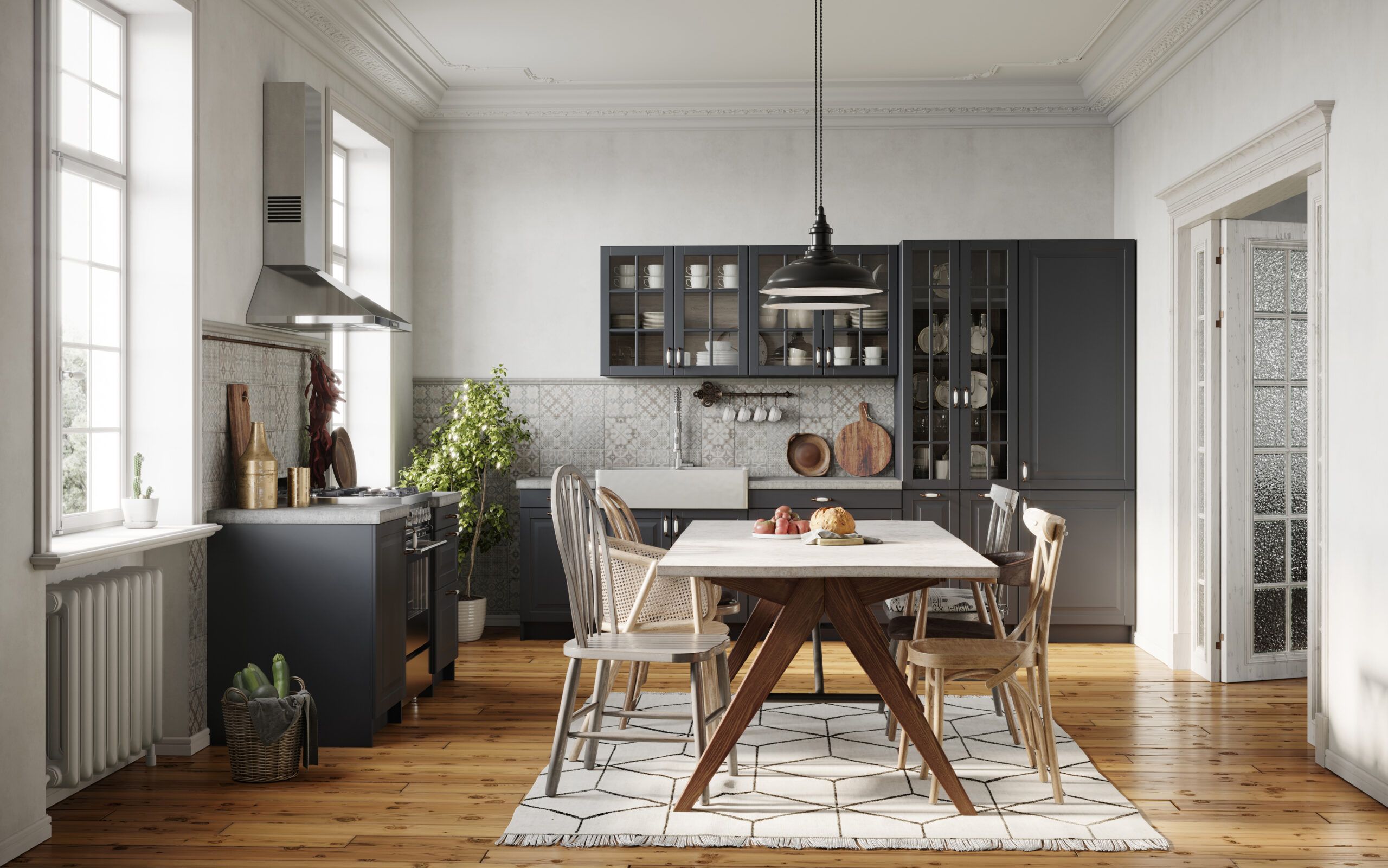 A kitchen with hardwood flooring and large windows.