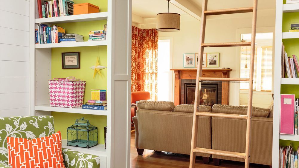 Built-in bookshelves with a rolling ladder.