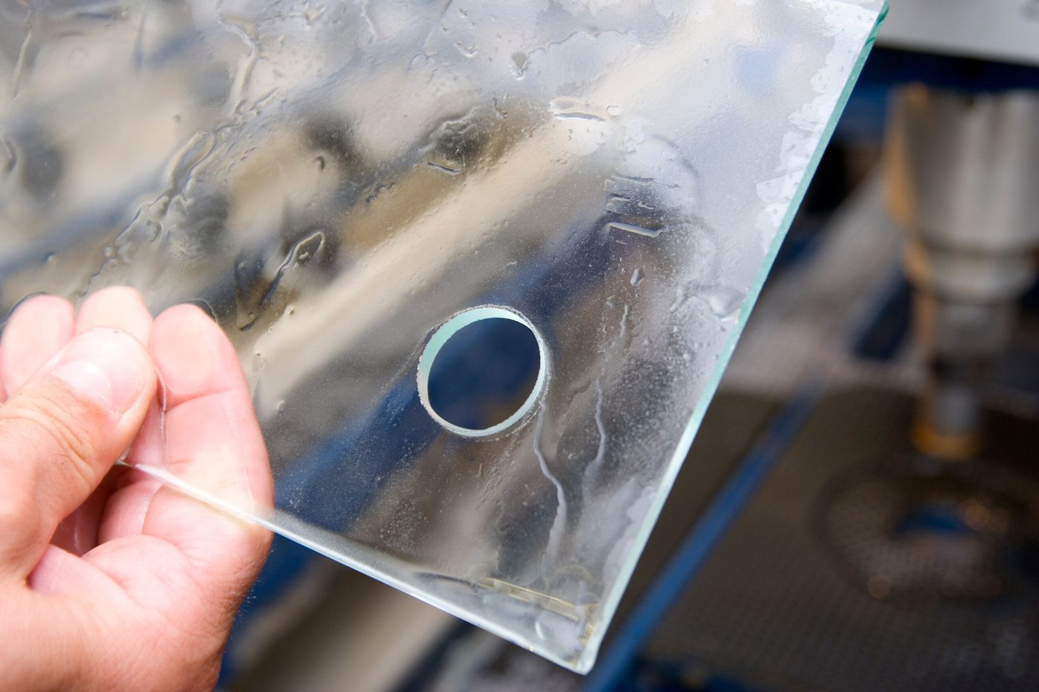 Drilling through glass